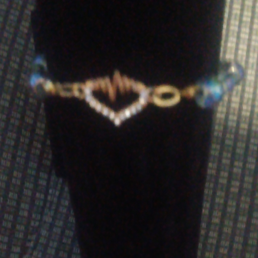 Elegant Heart Bracelet with Blue Accents